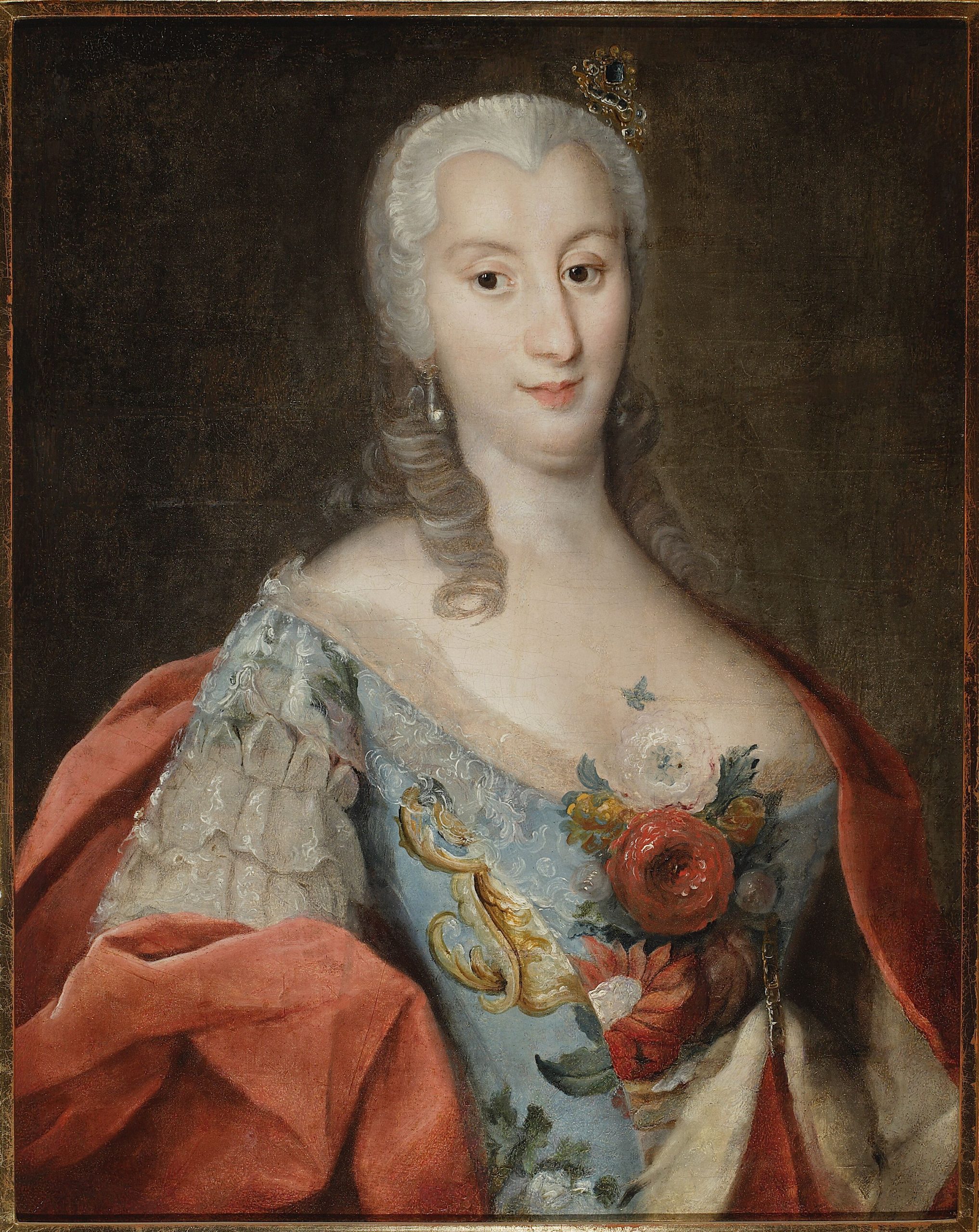 Portret kobiety w strojnej sukni.